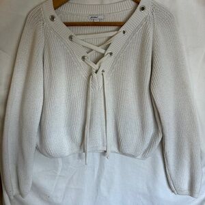 Ivory woman’s crop top ‘Subdued’ lacing at top. Size M Trendy piece for today!!